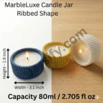 Marble Luxe ribbed candle jars in blue, yellow, and white, and multi color made from solid marble powder, shown with lit candle flames on a split white and wood background.